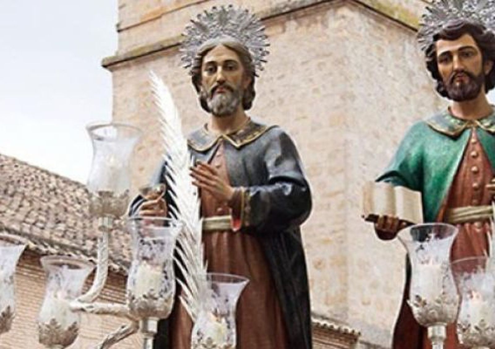 Cosme y Damián, portando ungüentos y un libro