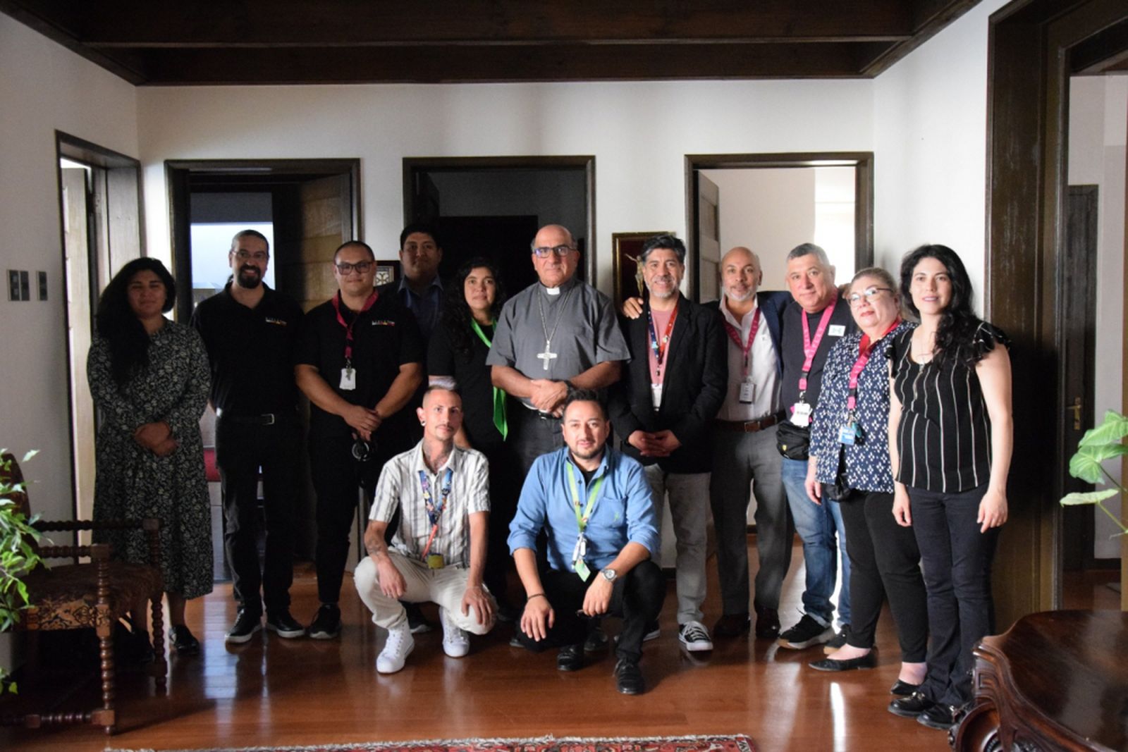 Trabajadores con arzobispo Chomali