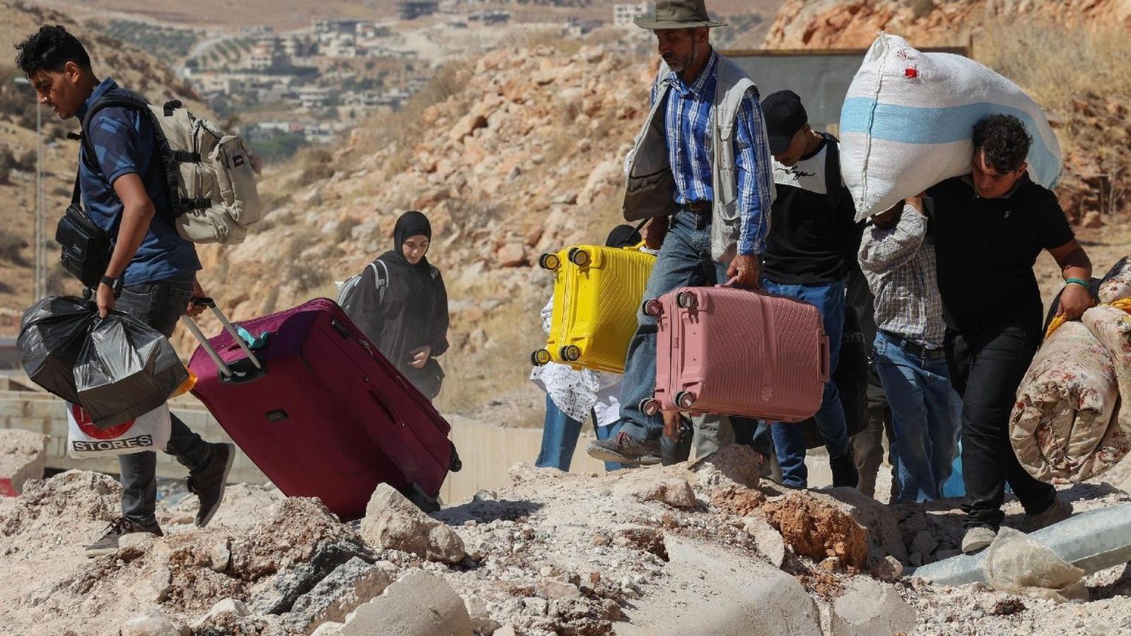 Líbano. Personas huyendo de los ataques israelíes