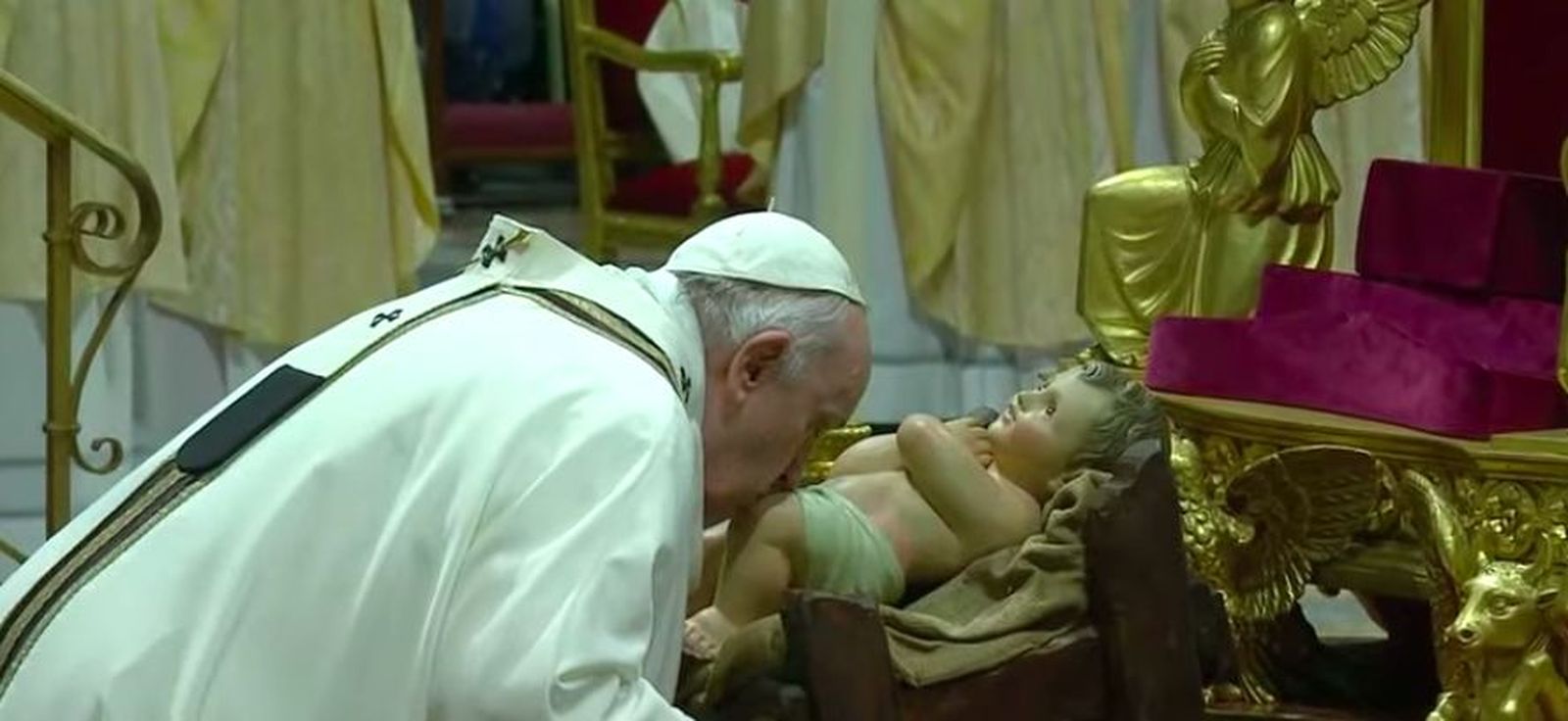 Francisco besa la rodilla del niño Jesús