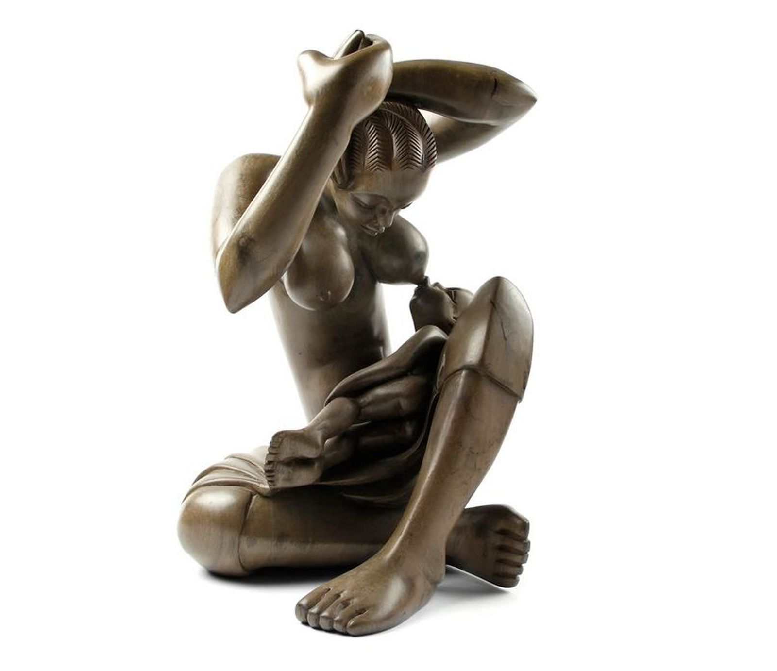 Maternidad en madera gris. (R. D. de Congo)